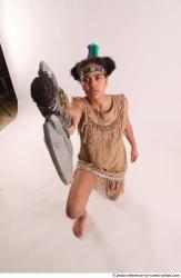 ANISE KNEELING POSE WITH AX 